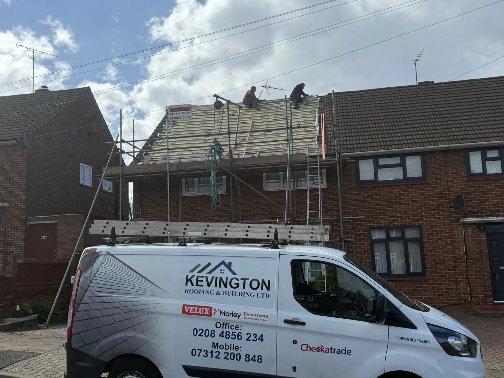 Professional roofers from Kevington Roofing and Building LTD performing a new roof installation on a house in Bromley