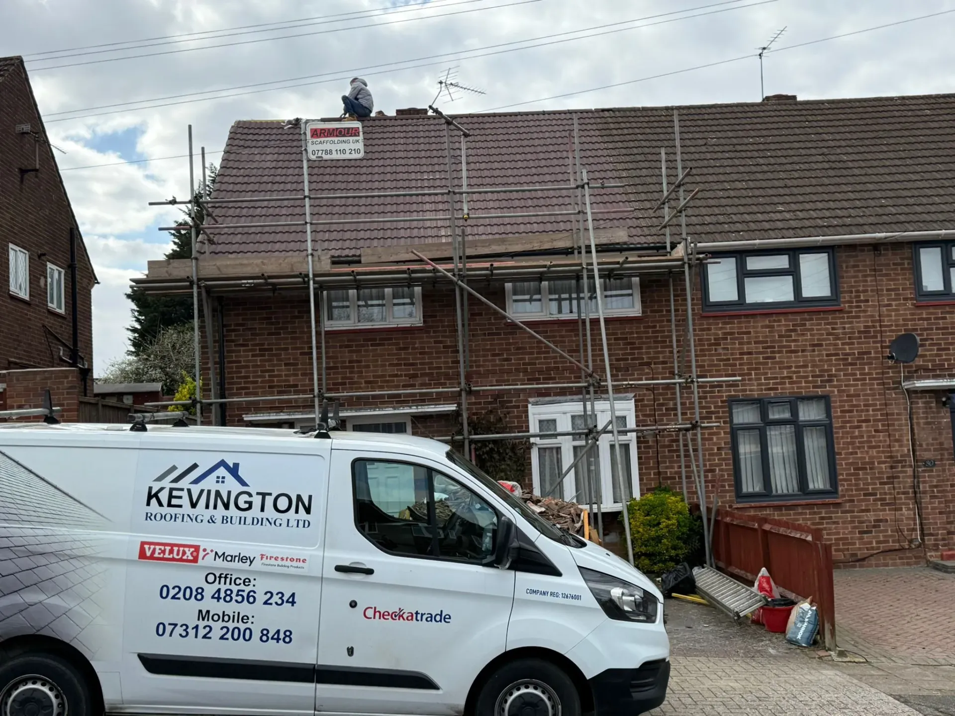 Kevington Roofing and Building LTD van at a residential roofing installation site in South East London